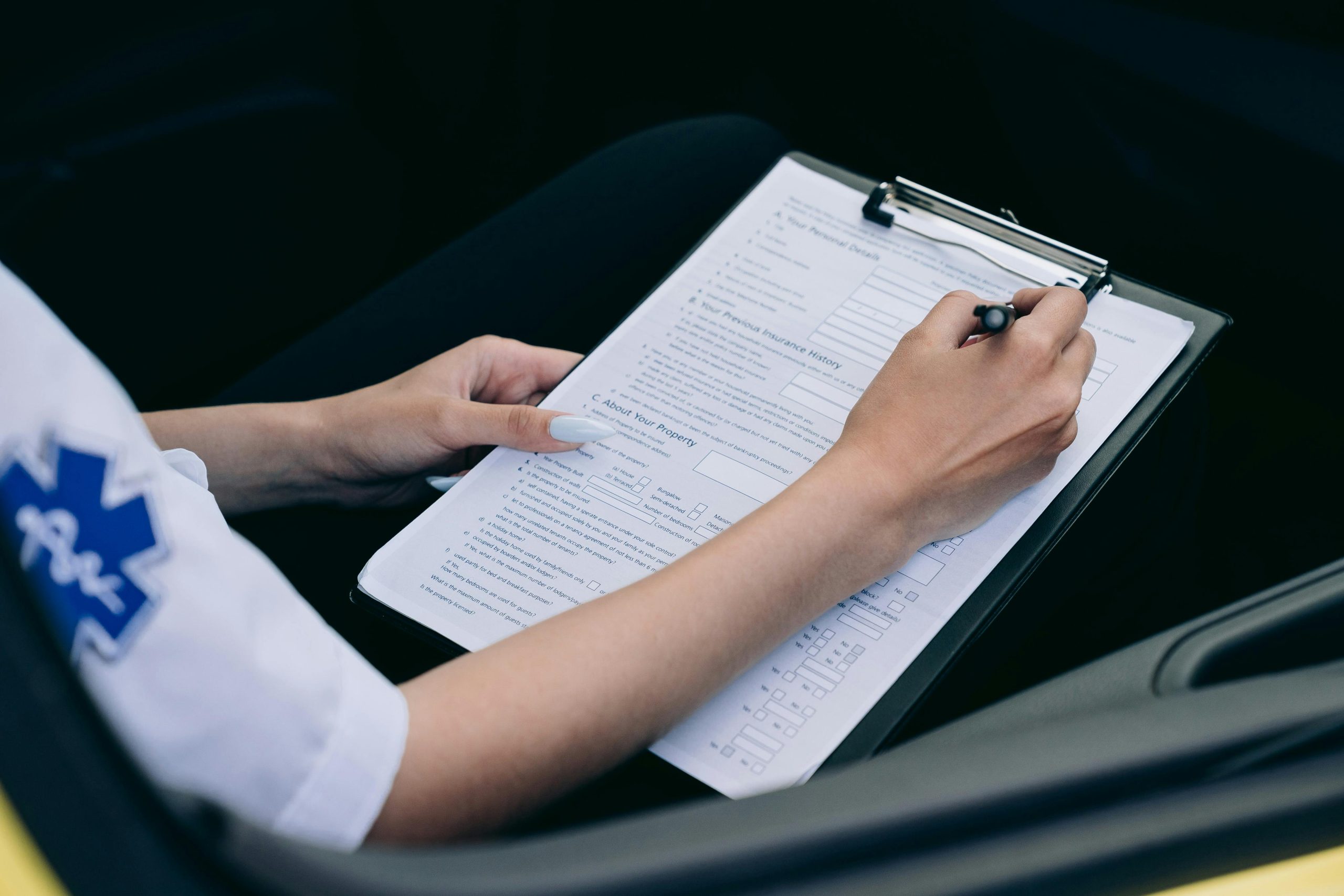 A person filling out the assistance form on their phone